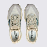 Tênis New Balance FuelCell Rebel V5 Bege Metalico