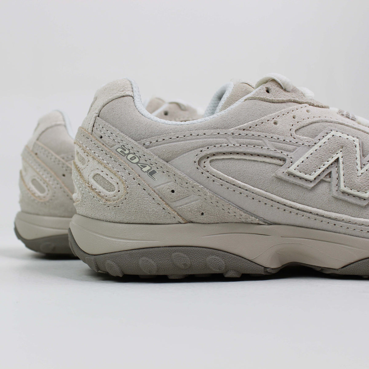 Tênis New Balance 204L Feminino Bege
